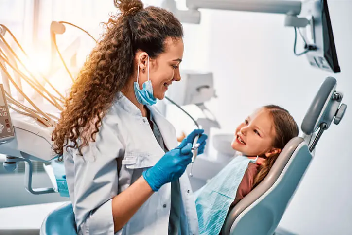 What problems are solved by a pediatric dentist?